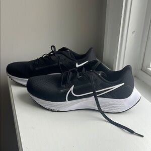 Brand new Nike Black and White Athletic Shoes